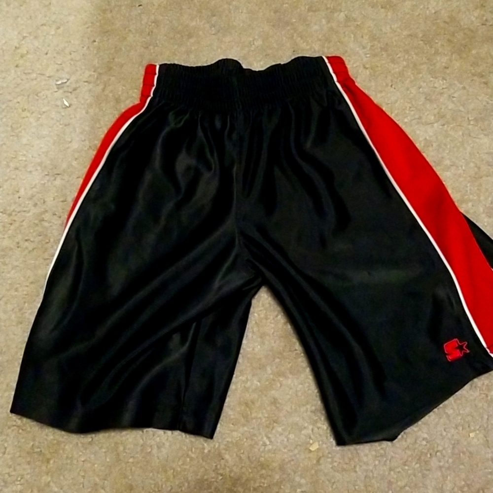 Size 6/7 Boy's Starter Brand Shorts Black w/ Red Stripe. Only worn a few times!
